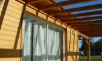 maison_bois_Artiguelouve_baie_pergola_contre_plongee